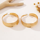 A Pair of Women's Gold Earrings