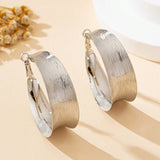 A Pair of Women's Gold Earrings