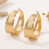 A Pair of Women's Gold Earrings