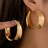 A Pair of Women's Gold Earrings